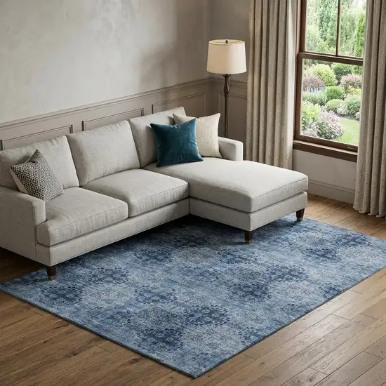 Navy Blue And Ivory Floral Medallion Distressed Washable Area Rug With UV Protection Photo 1