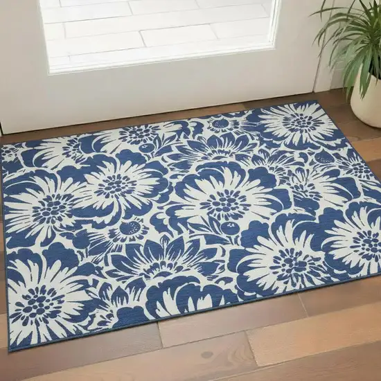 Navy Blue And Ivory Floral Washable Area Rug With UV Protection Photo 1