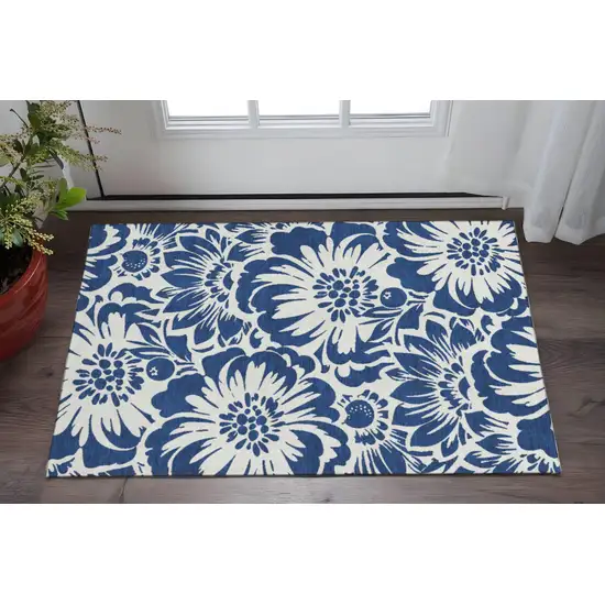 Navy Blue And Ivory Floral Washable Area Rug With UV Protection Photo 2