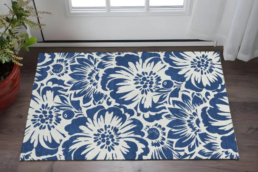 Navy Blue And Ivory Floral Washable Area Rug With UV Protection Photo 2