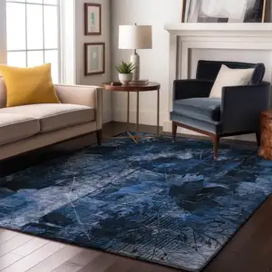 Photo of Navy Blue And Ivory Floral Washable Area Rug With UV Protection