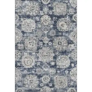 Photo of Navy Blue And Ivory Floral Washable Area Rug With UV Protection