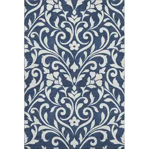 Photo of Navy Blue And Ivory Floral Washable Area Rug With UV Protection