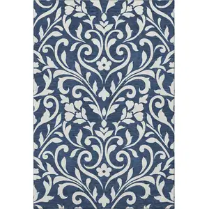 Photo of Navy Blue And Ivory Floral Washable Area Rug With UV Protection