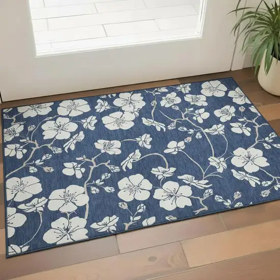 Navy Blue And Ivory Floral Washable Area Rug With UV Protection Photo 2