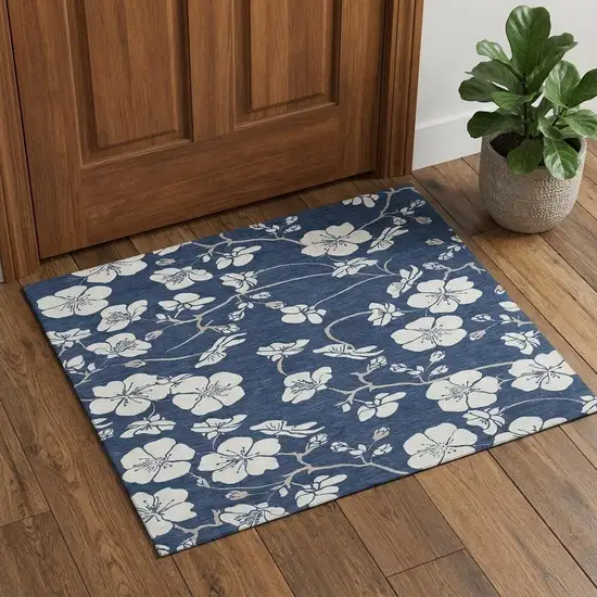 Navy Blue And Ivory Floral Washable Area Rug With UV Protection Photo 1