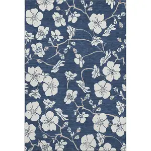 Photo of Navy Blue And Ivory Floral Washable Area Rug With UV Protection