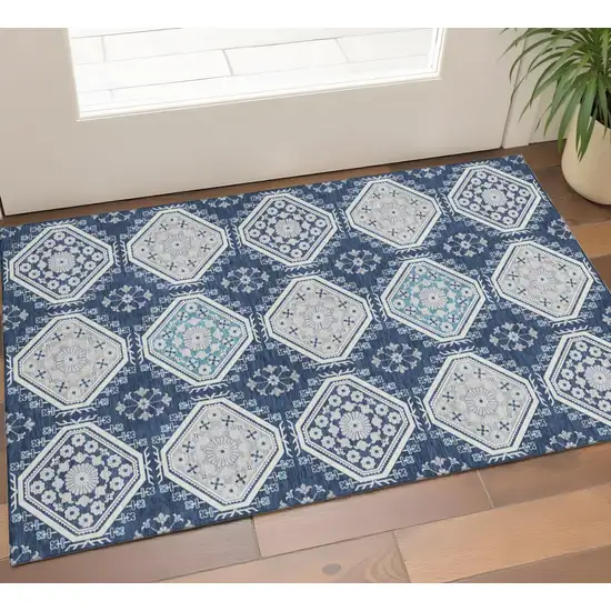 Navy Blue And Ivory Floral Washable Area Rug With UV Protection Photo 1