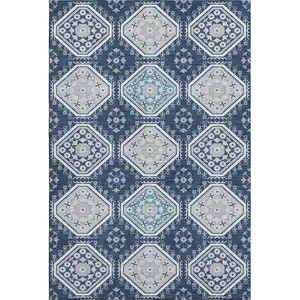 Photo of Navy Blue And Ivory Floral Washable Area Rug With UV Protection
