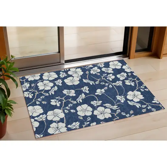 Navy Blue And Ivory Floral Washable Indoor Outdoor Area Rug Photo 1