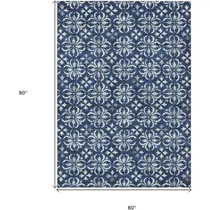 Photo of Navy Blue And Ivory Floral Washable Indoor Outdoor Area Rug