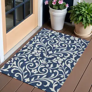 Photo of Navy Blue And Ivory Floral Washable Indoor Outdoor Area Rug
