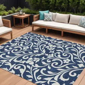 Photo of Navy Blue And Ivory Floral Washable Indoor Outdoor Area Rug