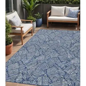Photo of Navy Blue And Ivory Floral Washable Indoor Outdoor Area Rug