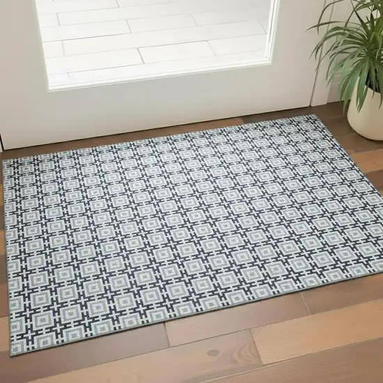 Navy Blue And Ivory Geometric Washable Area Rug With UV Protection Photo 1