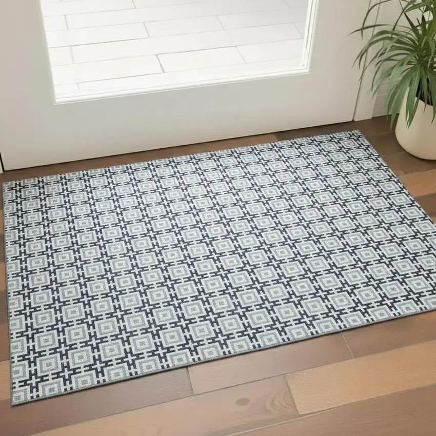 Navy Blue And Ivory Geometric Washable Area Rug With UV Protection Photo 1