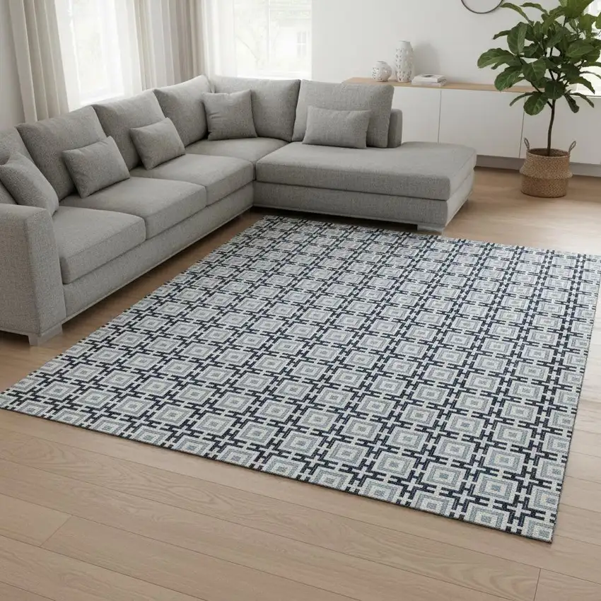 Navy Blue And Ivory Geometric Washable Area Rug With UV Protection Photo 1