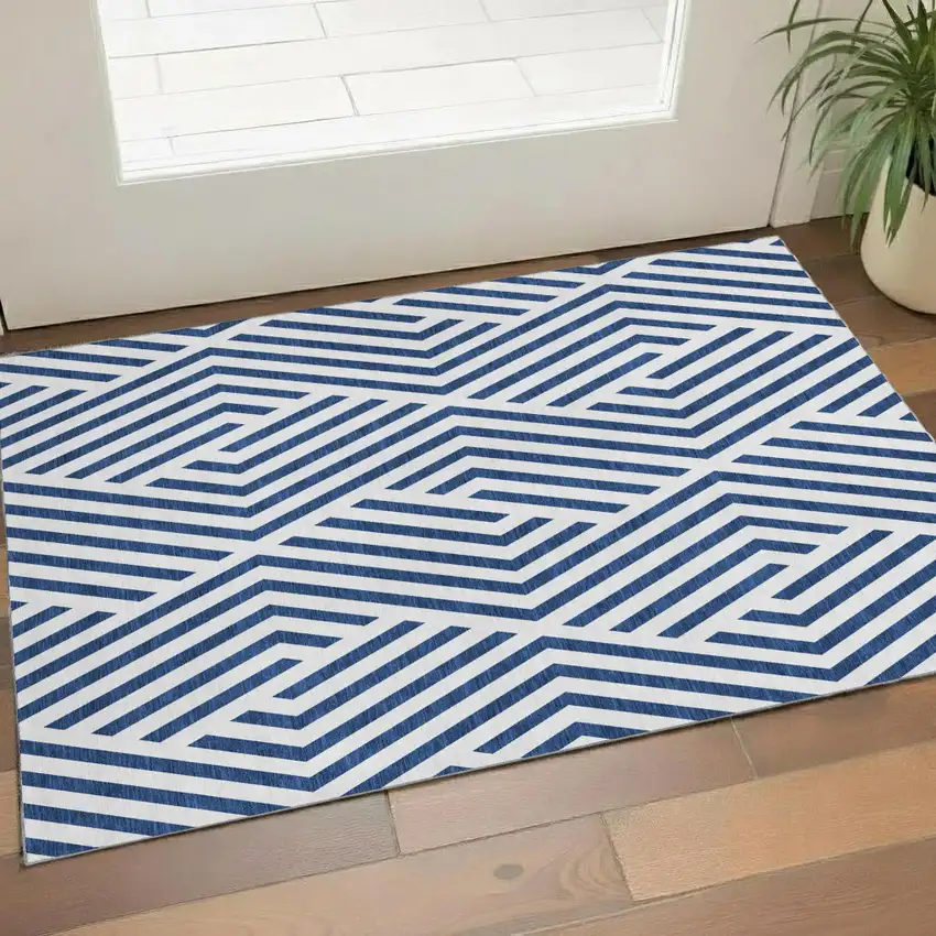 Navy Blue And Ivory Geometric Washable Area Rug With UV Protection Photo 1