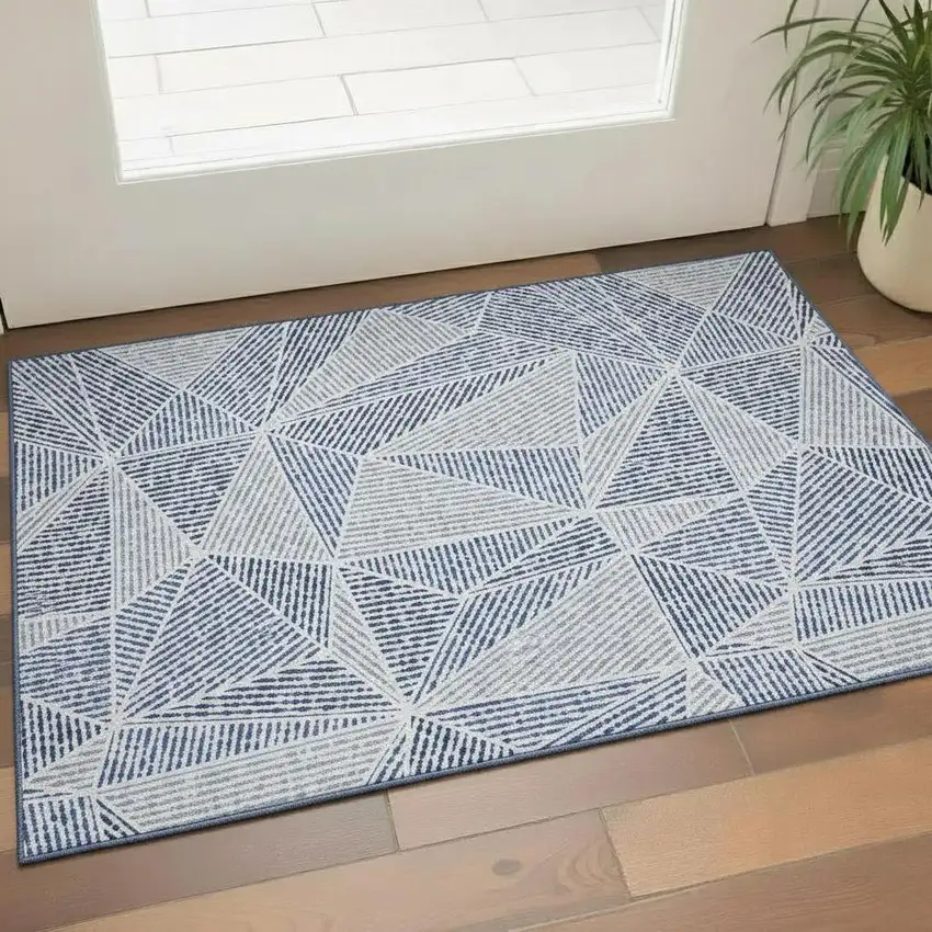 Navy Blue And Ivory Geometric Washable Area Rug With UV Protection Photo 1