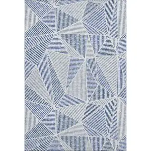 Photo of Navy Blue And Ivory Geometric Washable Area Rug With UV Protection