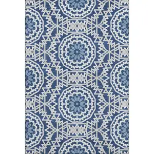 Photo of Navy Blue And Ivory Geometric Washable Area Rug With UV Protection