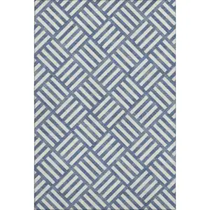Photo of Navy Blue And Ivory Geometric Washable Area Rug With UV Protection