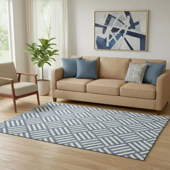 Navy Blue And Ivory Geometric Washable Area Rug With UV Protection Photo 1