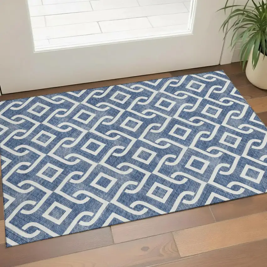Navy Blue And Ivory Geometric Washable Area Rug With UV Protection Photo 1