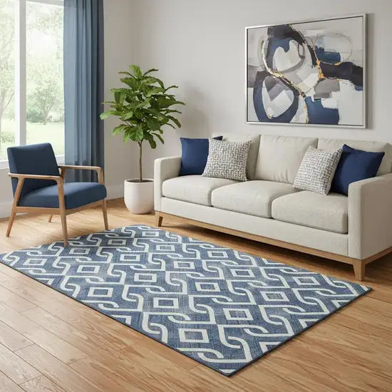 Navy Blue And Ivory Geometric Washable Area Rug With UV Protection Photo 1