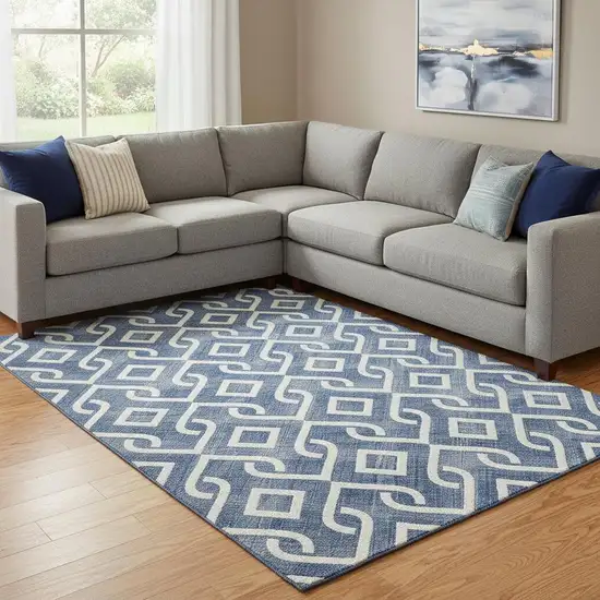 Navy Blue And Ivory Geometric Washable Area Rug With UV Protection Photo 1
