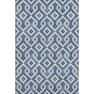 Photo of Navy Blue And Ivory Geometric Washable Area Rug With UV Protection