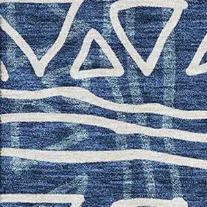 Photo of Navy Blue And Ivory Geometric Washable Area Rug With UV Protection