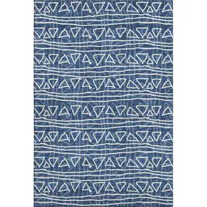 Photo of Navy Blue And Ivory Geometric Washable Area Rug With UV Protection