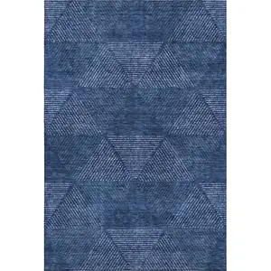 Photo of Navy Blue And Ivory Geometric Washable Area Rug With UV Protection