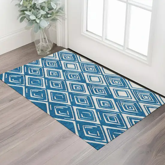 Navy Blue And Ivory Geometric Washable Area Rug With UV Protection Photo 1