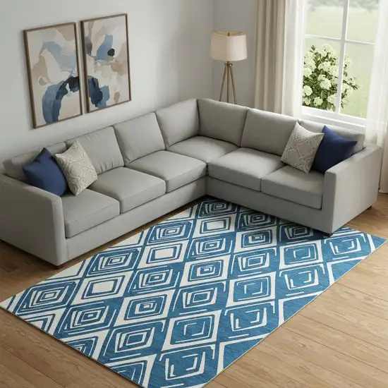 Navy Blue And Ivory Geometric Washable Area Rug With UV Protection Photo 1