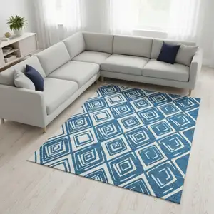 Photo of Navy Blue And Ivory Geometric Washable Area Rug With UV Protection
