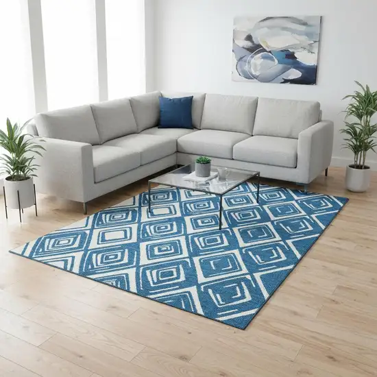 Navy Blue And Ivory Geometric Washable Area Rug With UV Protection Photo 1