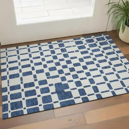 Navy Blue And Ivory Geometric Washable Area Rug With UV Protection Photo 1