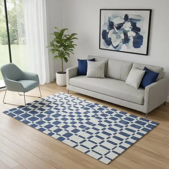 Navy Blue And Ivory Geometric Washable Area Rug With UV Protection Photo 1