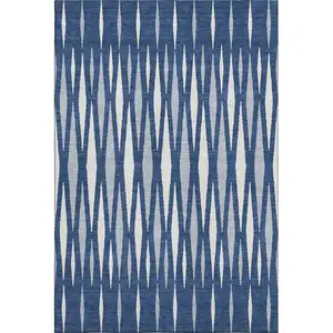 Photo of Navy Blue And Ivory Geometric Washable Area Rug With UV Protection