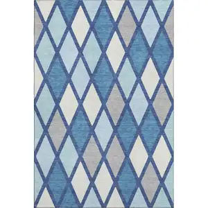 Photo of Navy Blue And Ivory Geometric Washable Area Rug With UV Protection