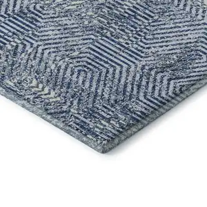 Photo of Navy Blue And Ivory Geometric Washable Area Rug With UV Protection
