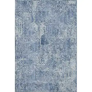 Photo of Navy Blue And Ivory Geometric Washable Area Rug With UV Protection