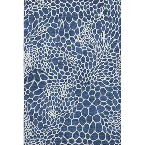 Photo of Navy Blue And Ivory Geometric Washable Area Rug With UV Protection