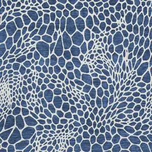 Photo of Navy Blue And Ivory Geometric Washable Area Rug With UV Protection