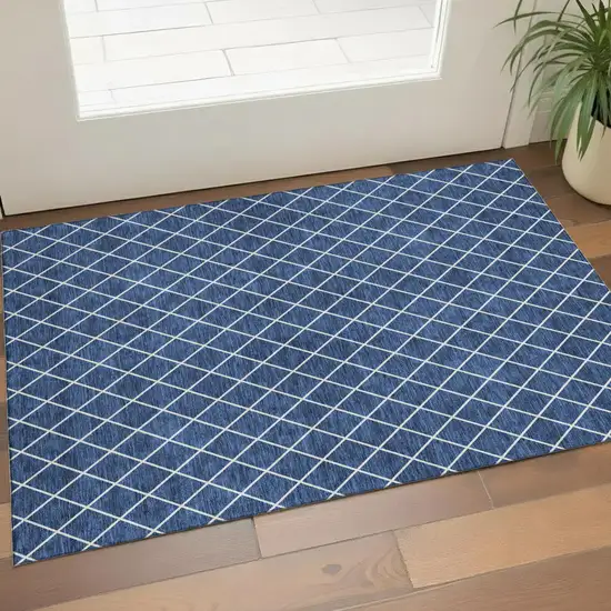 Navy Blue And Ivory Geometric Washable Area Rug With UV Protection Photo 1