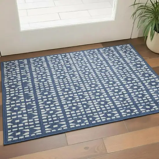 Navy Blue And Ivory Geometric Washable Area Rug With UV Protection Photo 2