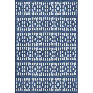 Photo of Navy Blue And Ivory Geometric Washable Area Rug With UV Protection