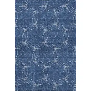 Photo of Navy Blue And Ivory Geometric Washable Area Rug With UV Protection